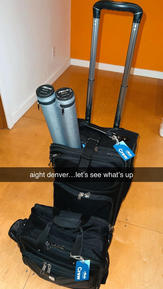 Crew roller bags and Echo fly rod tubes packed for a Denver layover