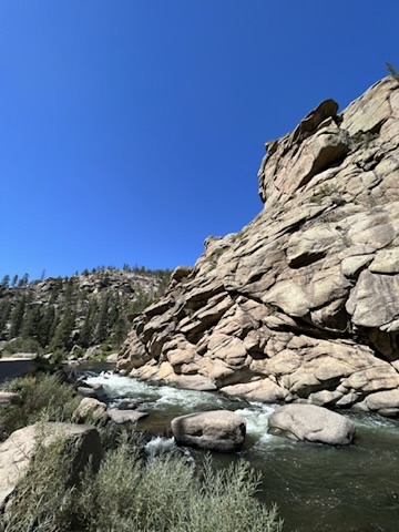 River running past granite cliffs in Eleven Mile Canyon