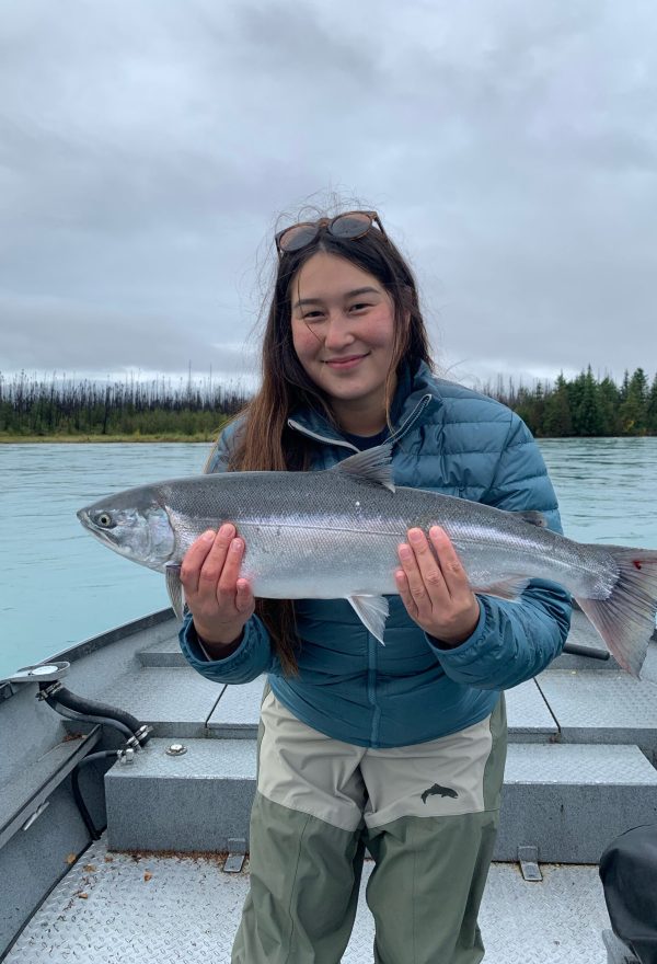 holding-silver-fish-boat